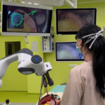 Endomersion: An Immersive Remote Guidance and Feedback System for Robot-Assisted Minimally Invasive Surgery